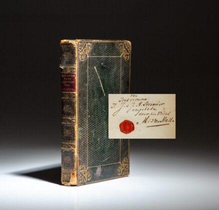 First edition of Het Leven en Karakter van den Admiraal Jhr. Jan Hendrik van Kinsbergen by M.C. van Hall. Includes a signed presentation slip from the author.