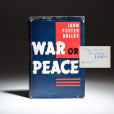 Signed first edition of War Or Peace by John Foster Dulles, inscribed to Life Magazine photographer, Alfred Eisenstaedt.