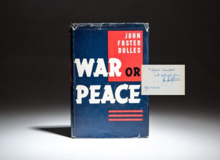 Signed first edition of War Or Peace by John Foster Dulles, inscribed to Life Magazine photographer, Alfred Eisenstaedt.