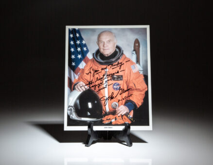 Photograph of astronaut John Glenn inscribed to Hollywood legend, Mickey Rooney and his wife, Jan Rooney.