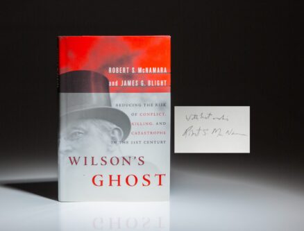 Signed by former Secretary of Defense, Robert S. McNamara, a first edition of Wilson's Ghost: Reducing the Risk of Conflict, Killing and Catastrophe in the 21st Century.