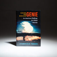 First edition, fourth printing of Caging the Nuclear Genie: An American Challenge for Global Security, signed by Stansfield Turner.