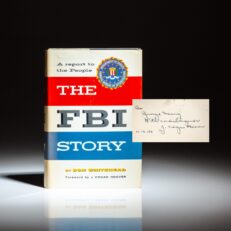 First edition of The FBI Story: A Report to the People by Don Whitehead, inscribed by FBI Director J. Edgar Hoover to the founder of the AFL-CIO, George Meany.