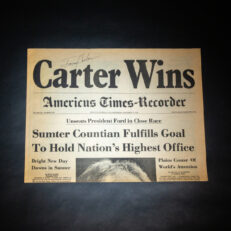 Hometown newspaper of Jimmy Carter, Americus Times-Recorder, with the banner headline, Carter Wins. This copy is signed by Jimmy Carter.