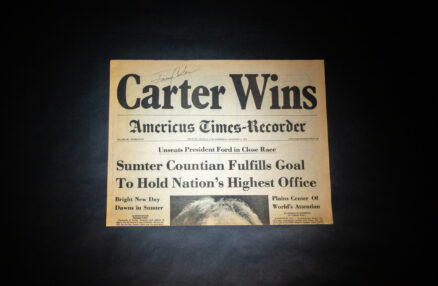 Hometown newspaper of Jimmy Carter, Americus Times-Recorder, with the banner headline, Carter Wins. This copy is signed by Jimmy Carter.