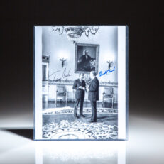 Signed photograph of President Gerald R. Ford and President-elect Jimmy Carter at the White House.