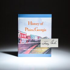 History of Plains, Georgia, compiled by the Plains Historical Preservation Trust. This copy is signed by President Jimmy Carter.