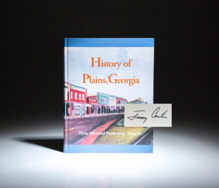 History of Plains, Georgia, compiled by the Plains Historical Preservation Trust. This copy is signed by President Jimmy Carter.