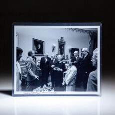 Photograph of President Carter meeting with the Justices of the Supreme Court and their wives, signed by President Jimmy Carter and Chief Justice Warren E. Burger.