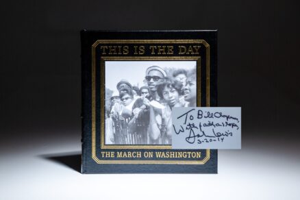 Signed by Congressman John Lewis, This is the Day: The March on Washington, photographed by Leonard Freed.