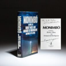 First edition of Monimbo, a novel by Robert Moss and Arnaud de Borchgrave, inscribed to Bill Safire.