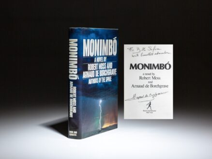 First edition of Monimbo, a novel by Robert Moss and Arnaud de Borchgrave, inscribed to Bill Safire.