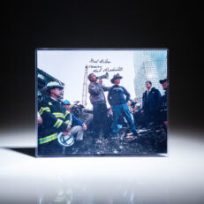 Photograph of President George W. Bush and New York City fireman Bob Beckwith, inscribed by Beckwith.