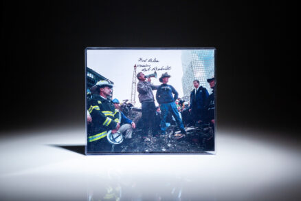 Photograph of President George W. Bush and New York City fireman Bob Beckwith, inscribed by Beckwith.