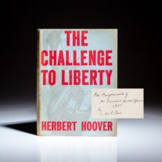 First edition, third printing of The Challenge to Liberty, with a unique inscription by former President Herbert Hoover.