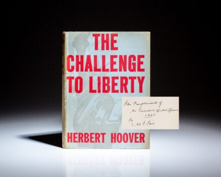 First edition, third printing of The Challenge to Liberty, with a unique inscription by former President Herbert Hoover.