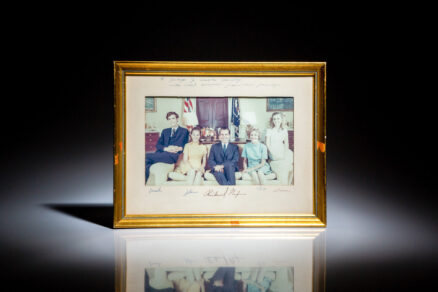 Signed photograph of President Richard Nixon and the full Nixon family at the White House in 1969.