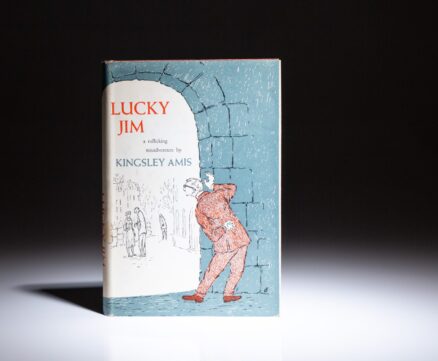 First American edition of Lucky Jim by Kingsley Amis, with advance review card laid-in.