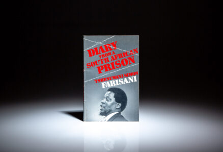 First edition of Diary from a South African Prison by Tshenuwani Simon Farisani, inscribed to U.S. Ambassador Ed Perkins.
