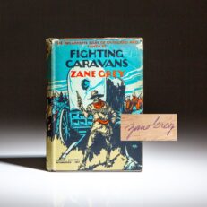 Signed first edition of Fighting Caravans by Zane Grey.