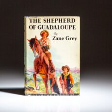 First edition of The Shepherd of Guadaloupe by Zane Grey, with a twentieth-anniversary leaflet from the publisher laid in.