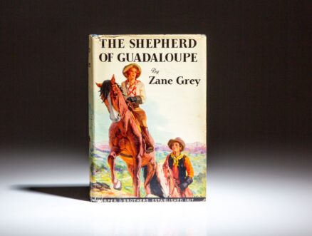 First edition of The Shepherd of Guadaloupe by Zane Grey, with a twentieth-anniversary leaflet from the publisher laid in.