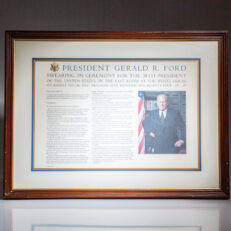 Framed broadside titled President Gerald R. Ford: Swearing-In Ceremony for the 38th President of the United States. This copy is signed by President Gerald R. Ford.