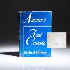 Inscribed first edition of America's First Crusade by former President Herbert Hoover, in publisher's first state dust jacket.