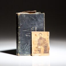 Pocket diary belonging to Sergeant James B. Hudson of Company I, 7th Regiment U.S. Veteran Volunteer Infantry. Includes a photograph of Sergeant Hudson in his uniform.