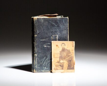 Pocket diary belonging to Sergeant James B. Hudson of Company I, 7th Regiment U.S. Veteran Volunteer Infantry. Includes a photograph of Sergeant Hudson in his uniform.