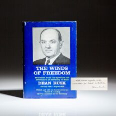 Signed first edition of The Winds of Freedom by Secretary of State Dean Rusk, inscribed to his assistant Robert McClintock.