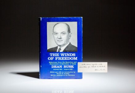 Signed first edition of The Winds of Freedom by Secretary of State Dean Rusk, inscribed to his assistant Robert McClintock.