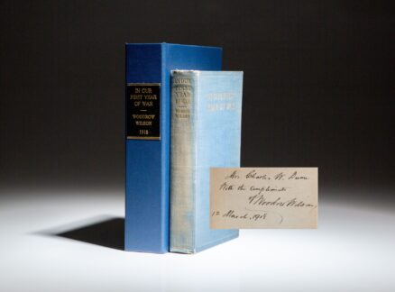 First edition of In Our First Year of War, signed by President Woodrow Wilson in 1918.