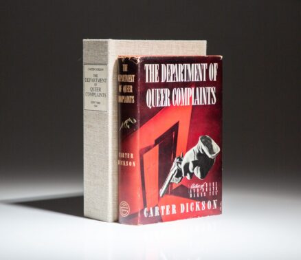 First edition, first printing of The Department of Queer Complaints by Carter Dickson, in the publisher's first state dust jacket.