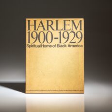 Scarce exhibit portfolio titled HARLEM 1900-1929: Spiritual Home of Black America published by the Schomburg Center for Research in Black Culture.