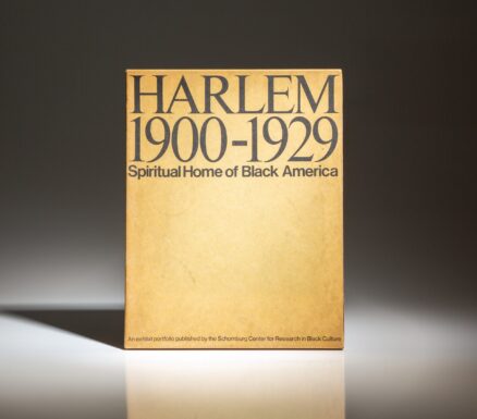 Scarce exhibit portfolio titled HARLEM 1900-1929: Spiritual Home of Black America published by the Schomburg Center for Research in Black Culture.