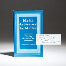 Inscribed to future Secretary of State Colin Powell, the first edition of Media Access and the Military by Judith Raine Baroody.