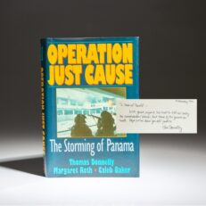 Inscribed to Chairman of the Joint Chiefs, Gen. Colin Powell, the first edition of Operation Just Cause by Thomas Donnelly.