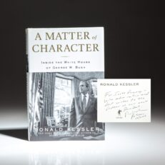 A Matter of Character: Inside The White House of George W. Bush, Inscribed to Scott Romney, the brother of Senator Mitt Romney, with a prescient inscription.