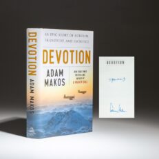 First edition of Devotion: An Epic Story Of Heroism, Friendship, and Sacrifice, signed by the author, Adam Makos, and subject of the book, Lt. Thomas J. Hudner Jr.