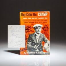 First edition of They Call Him Champ, signed by Hyman R. Segal.