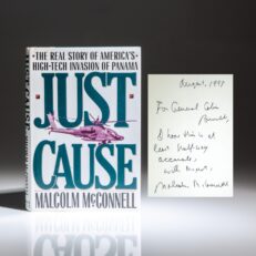 Inscribed to the Chairman of the Joint Chiefs of Staff Colin Powell, the first edition of Just Cause by Malcolm McConnell.