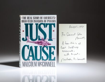 Inscribed to the Chairman of the Joint Chiefs of Staff Colin Powell, the first edition of Just Cause by Malcolm McConnell.