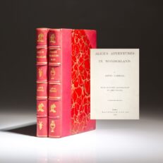 Early edition of Alice's Adventures in Wonderland, with Through the Looking-Glass by Lewis Carroll, uniformly bound in red morocco.