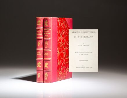 Early edition of Alice's Adventures in Wonderland, with Through the Looking-Glass by Lewis Carroll, uniformly bound in red morocco.