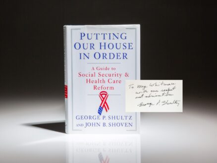 Signed copy of Putting Our House in Order by Secretary of State George Shultz to business executive Meg Whitman.