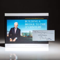 Inscribed to actor and comedian Billy Crystal, the first printing of The William J. Clinton Presidential Center: Building A Bridge to the 21st Century.