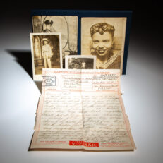 Series of photographs and handwritten letters from Private First Class Henry B. Ferguson, an African American solider serving in the 742nd Anti-Aircraft Artillery Battalion in the South Pacific during World War II, to Miss Elizabeth Webb of Bradenton, Florida.