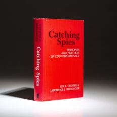 From the collection of William Safire, the first edition of Catching Spies by H.H.A. Cooper and Lawrence J. Redlinger.