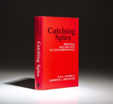 From the collection of William Safire, the first edition of Catching Spies by H.H.A. Cooper and Lawrence J. Redlinger.